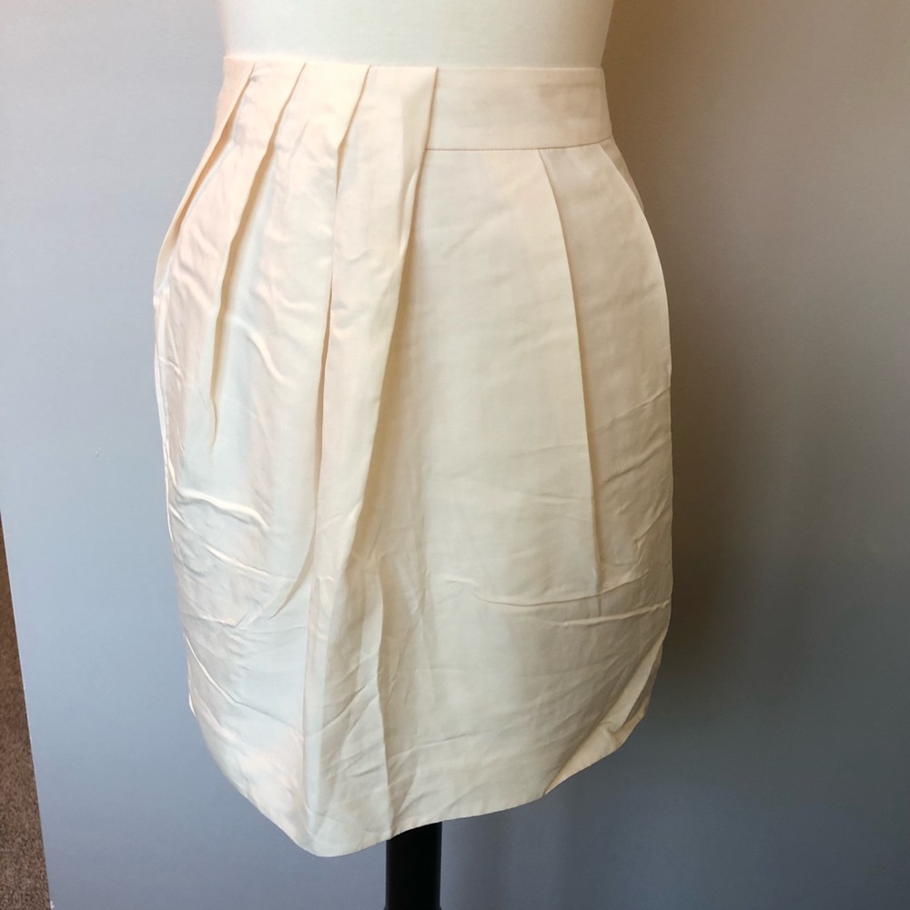 White silk pleated mini skirt